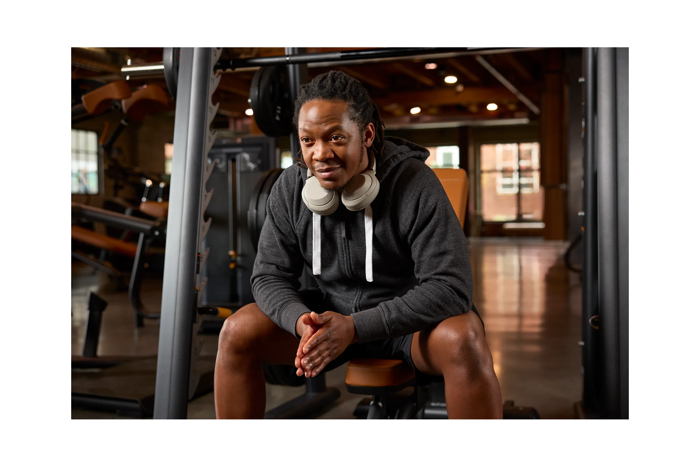 Strength Closeup, Man on DPL Smith Machine and Bench (Padded)